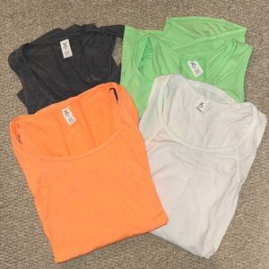 Xersion Women’s Soft Performance Scoop
Neck Sleeveless Tank Tops-Lot of 4